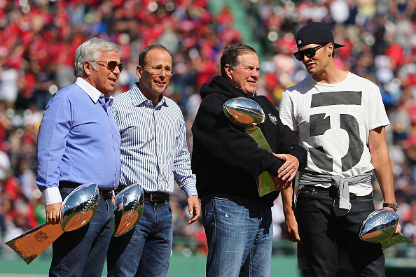 Owner Robert Kraft, President Jonathan Kraft, Coach Bill Belichick, and QB Tom Brady