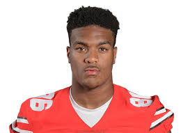 Dre'Mont Jones football team picture. 73rd in mock. 